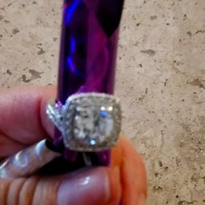 Size 6 cubic zirconia 2 carat silver plated ring.